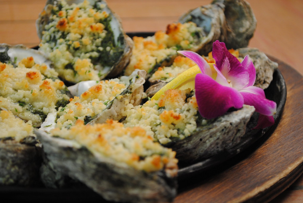 One dozen raw oyster appetizer plate.